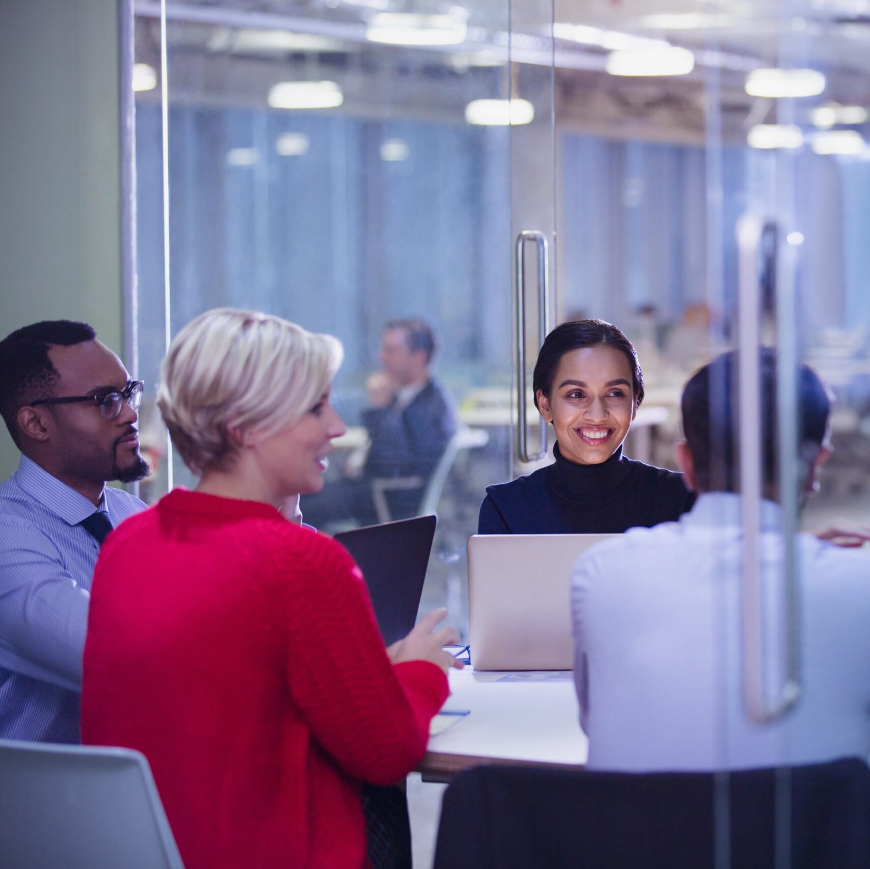 A modern boardroom environment, depicting the efficiency and collaboration brought by e-trading solutions for banks.